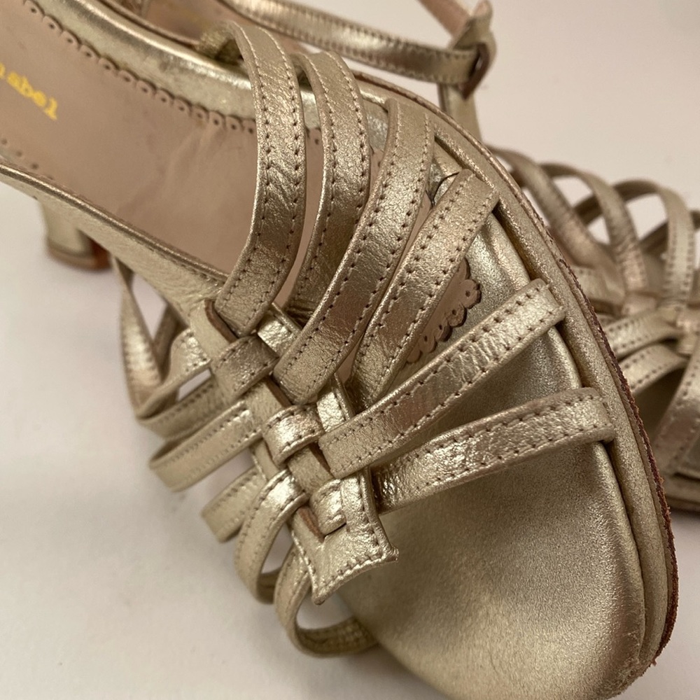 JACQUELINE SCHNABEL (40-½) 9-1/2.  Drapey, silver metallic open toed sandals
